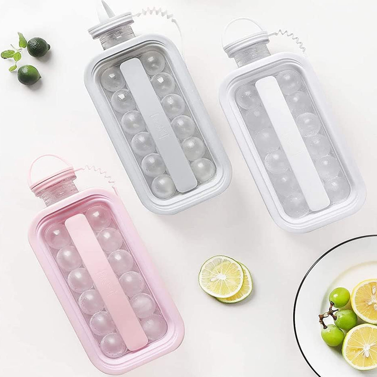 Ice ball maker bottles in pink, grey and white