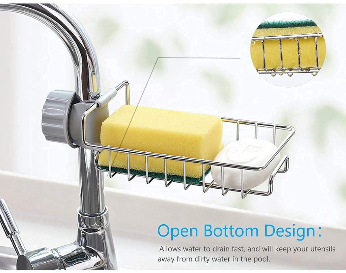 Sponge and soap in the tap rack, showing the open wire base that lets water drip away
